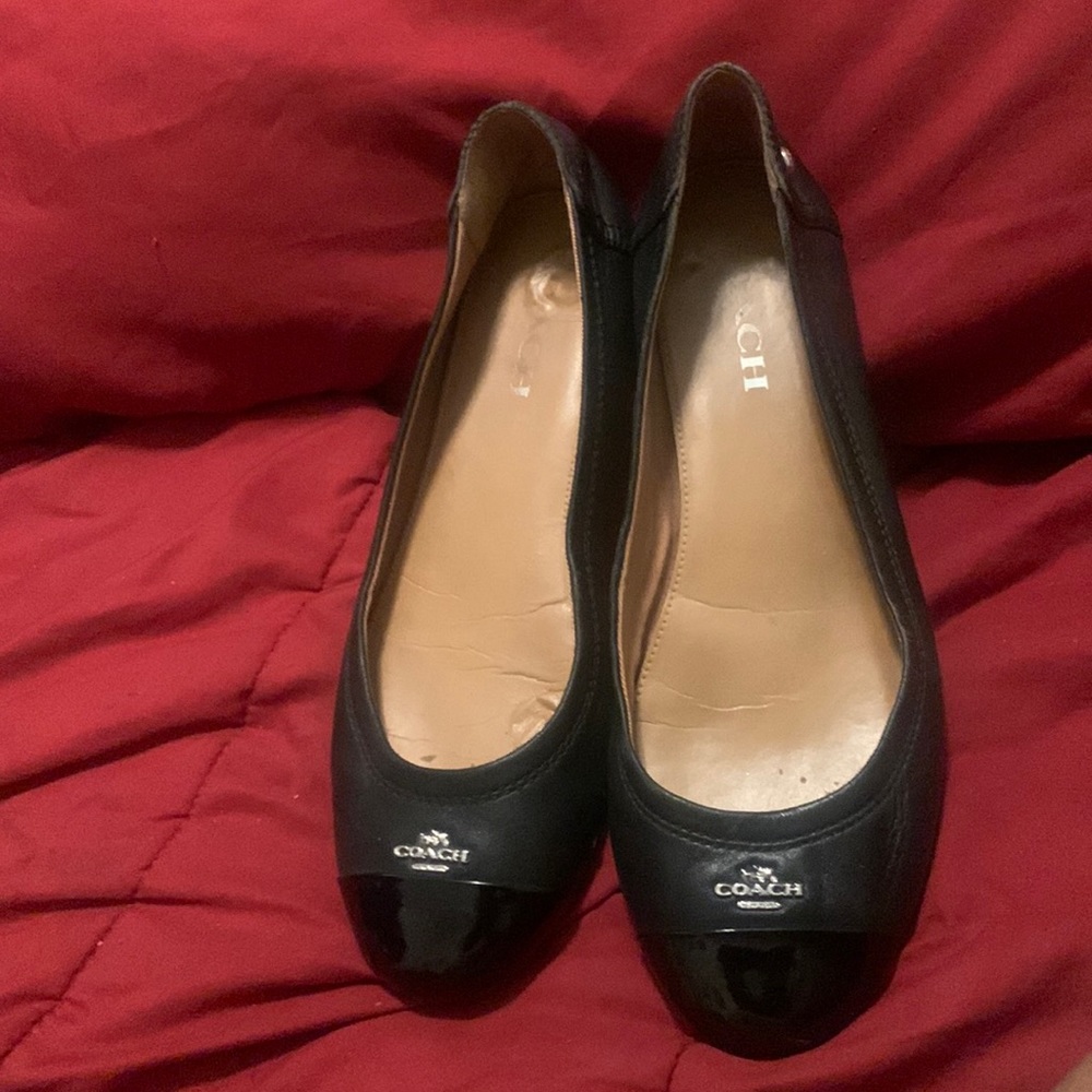 Coach black leather with patent leather at the tip ballet flats.